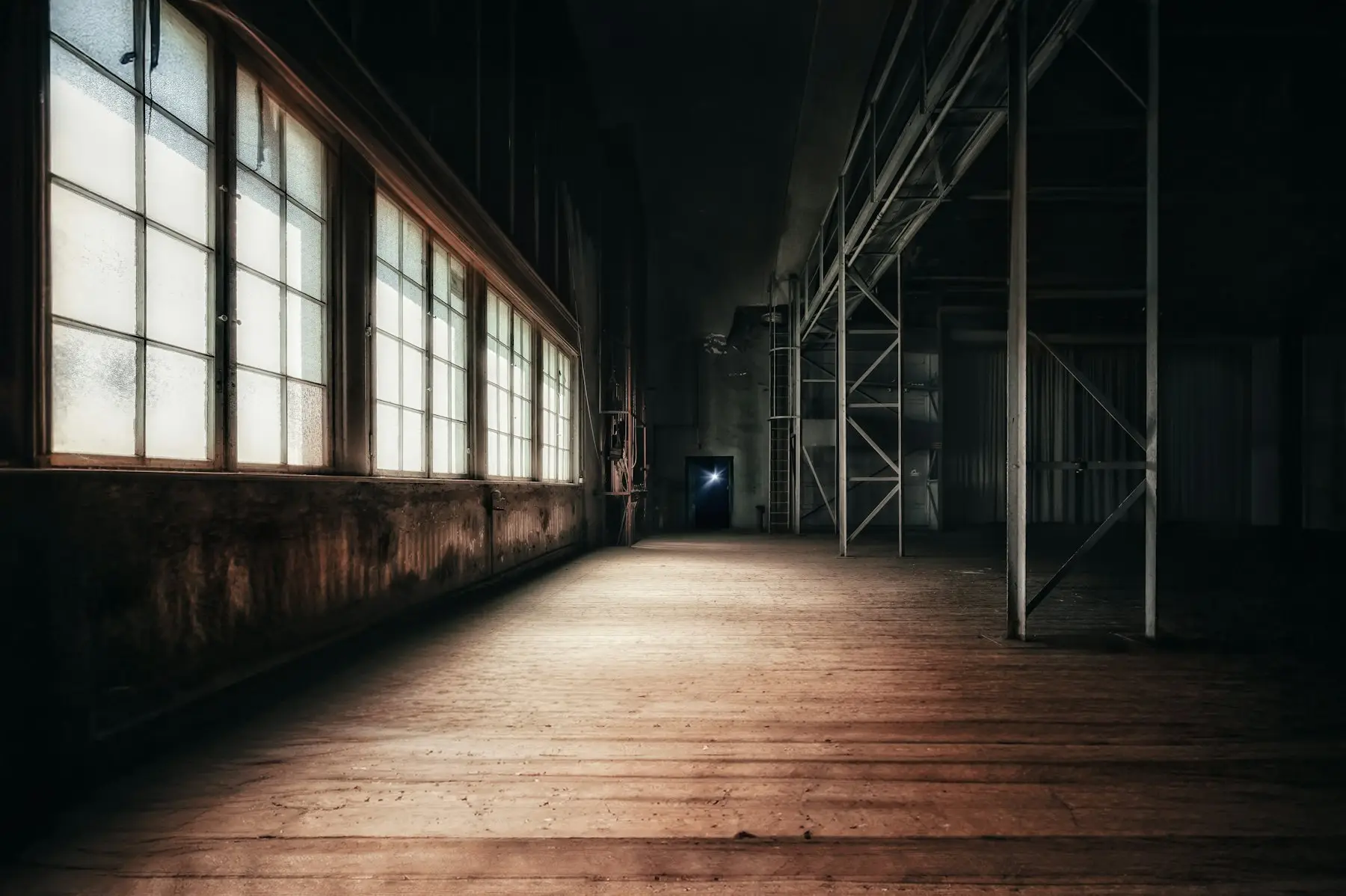 Dark empty warehouse interior